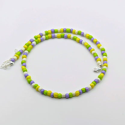 Fran handmade beaded necklace with green, yellow, lilac and white glass beads, finished with silver clasp and extension chain.